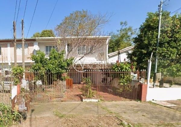 Casa à venda com 3 quartos, 121m², 2 vagas, Rua Palestina no bairro Jardim do Salso em Porto Alegre