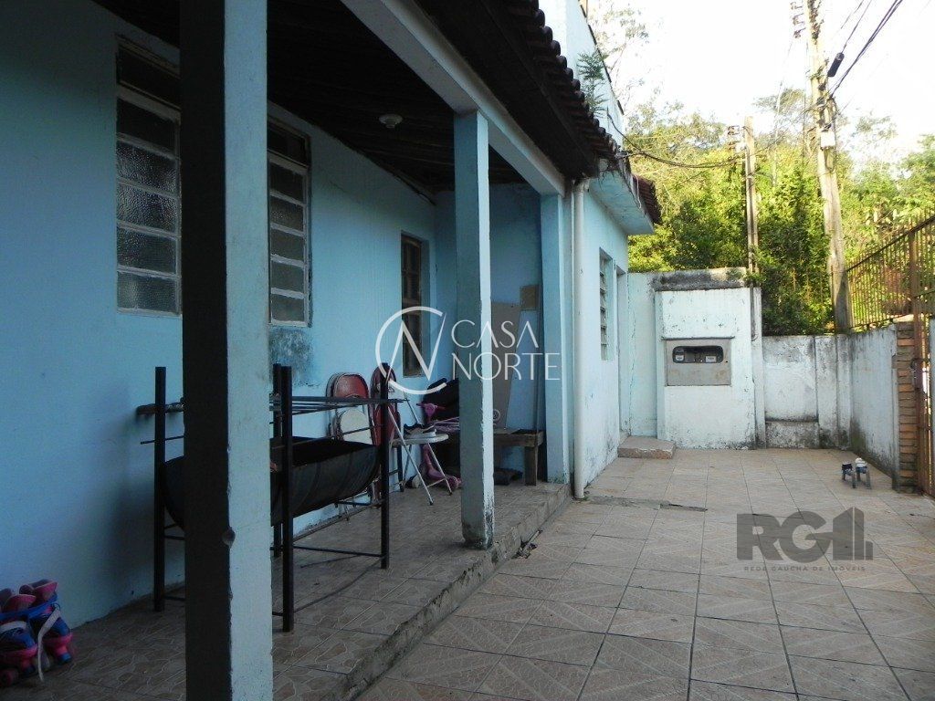 Casa à venda com 7 quartos, 259m², 1 vaga, Rua São Joaquim no bairro Glória em Porto Alegre