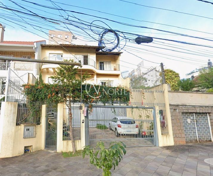 Casa à venda com 5 quartos, 380m², 4 suítes, 4 vagas, Rua Isidoro Trêssi no bairro Jardim Botânico em Porto Alegre
