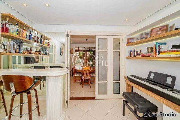 Casa de Condomínio à venda com 3 quartos, 129m², 1 suíte, 2 vagas, Avenida Eduardo Prado no bairro Cavalhada em Porto Alegre