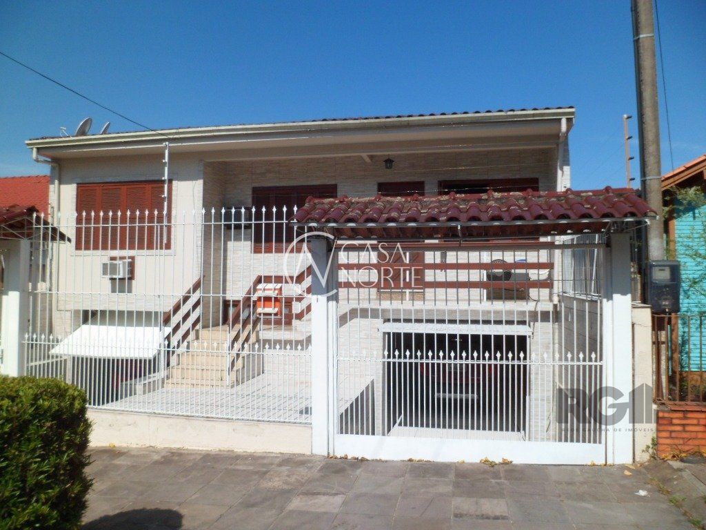 Casa à venda com 3 quartos, 245m², 1 suíte, 2 vagas, Paul Harris no bairro Jardim Itu em Porto Alegre