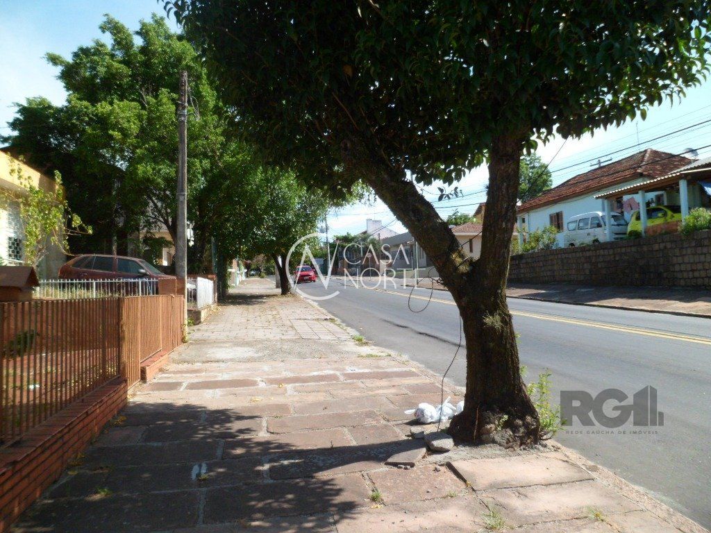 Casa à venda com 3 quartos, 245m², 1 suíte, 2 vagas, Paul Harris no bairro Jardim Itu em Porto Alegre