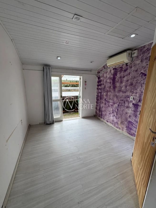 Casa de Condomínio à venda com 2 quartos, 40m², 1 vaga, Rua Deputado Cunha Bueno no bairro Vila Nova em Porto Alegre