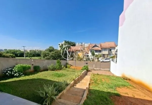 Casa à venda com 2 quartos, 85m², 2 vagas, Rua Hugo Nelson Magalhães no bairro Parque Santa Fé em Porto Alegre
