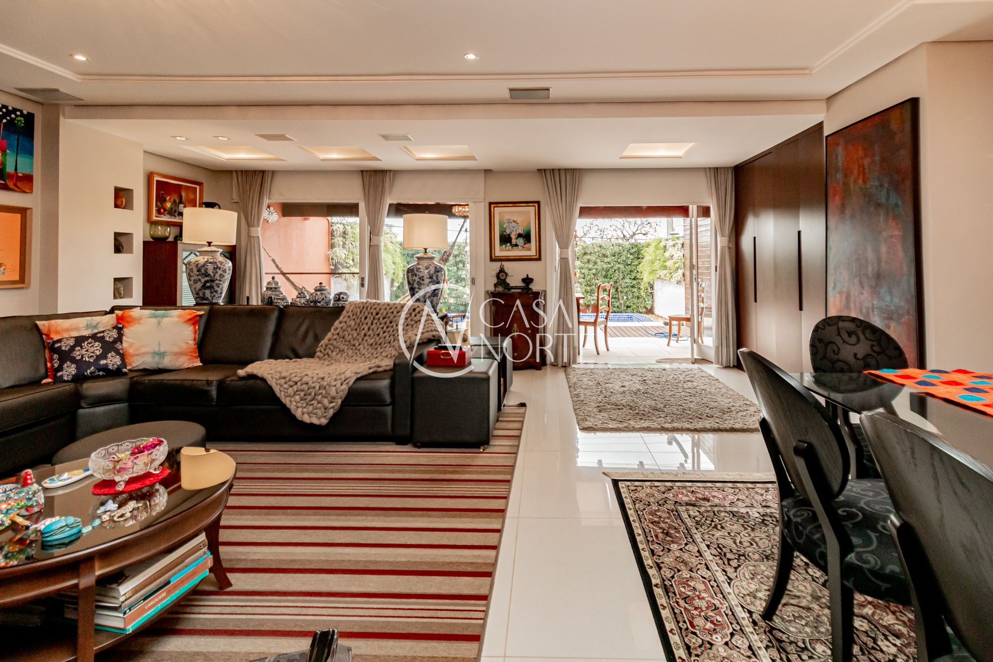 Casa de Condomínio à venda com 3 quartos, 329m², 3 suítes, 2 vagas, Rua Ênio Andrade no bairro Três Figueiras em Porto Alegre