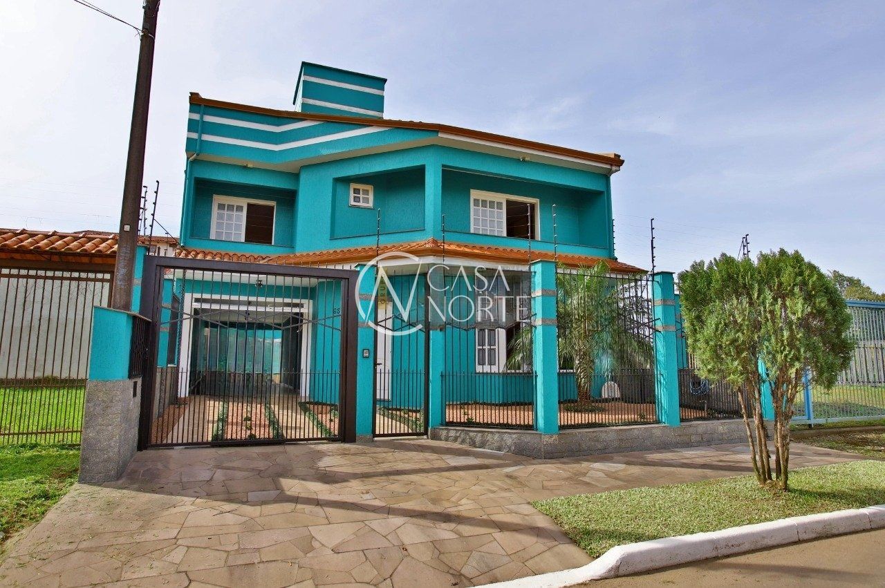 Casa à venda com 3 quartos, 263m², 1 suíte, 2 vagas, Rua Santo Expedito no bairro Parque Santa Fé em Porto Alegre