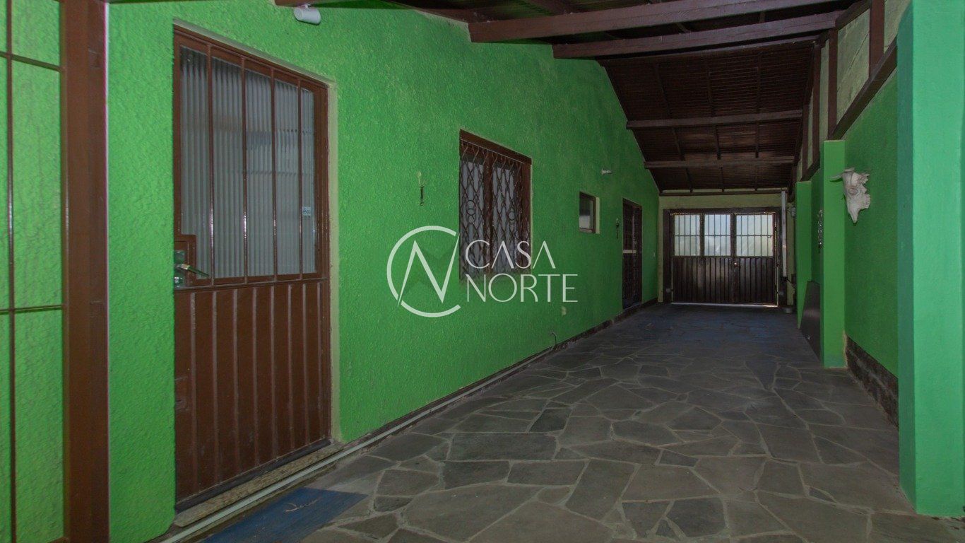 Casa à venda com 3 quartos, 264m², 1 suíte, 4 vagas, Rua Doutor Affonso Sanmartin no bairro Jardim do Salso em Porto Alegre