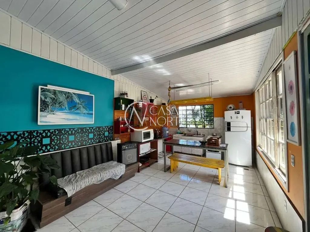 Casa à venda com 3 quartos, 126m², 3 vagas, Rua Amábile Samarani Ferreira no bairro Campo Novo em Porto Alegre