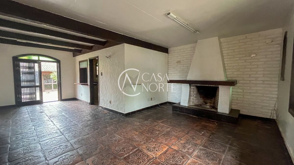 Casa à venda com 5 quartos, 390m², 1 suíte, 5 vagas, Rua Doutor Mário Totta no bairro Tristeza em Porto Alegre