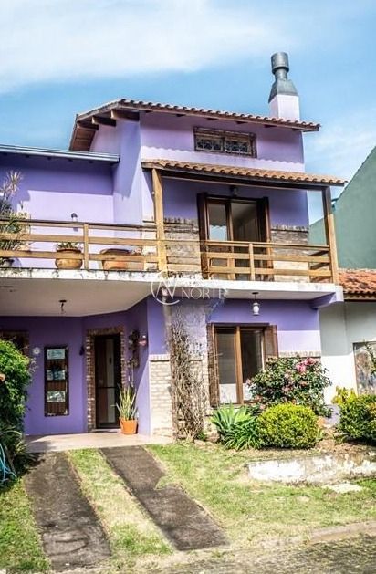 Casa de Condomínio à venda com 2 quartos, 166m², 1 suíte, 2 vagas, Rua Ponciano Pacheco da Silveira no bairro Guarujá em Porto Alegre