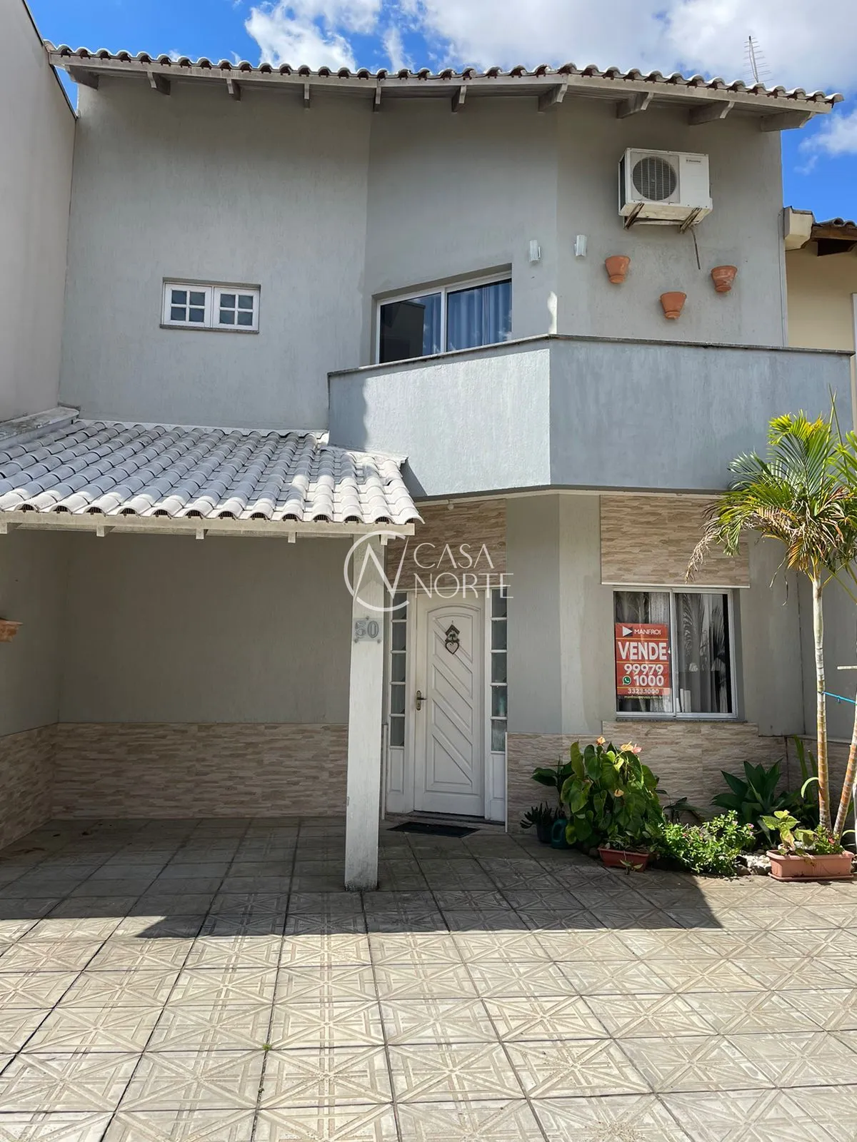 Casa de Condomínio à venda com 3 quartos, 140m², 2 vagas, Rua Deputado Hugo Mardini no bairro Passo das Pedras em Porto Alegre