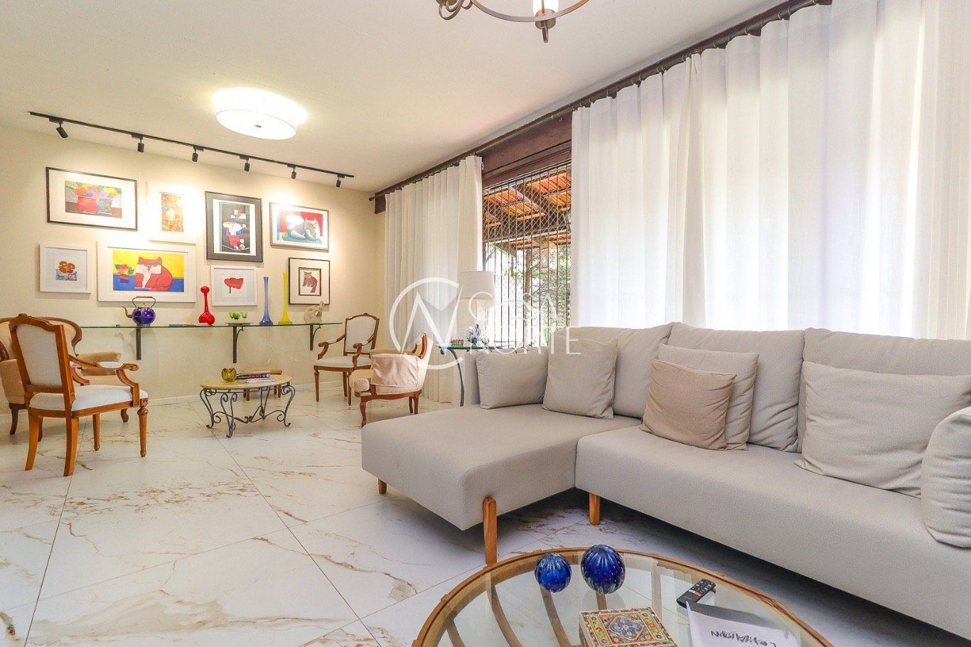 Casa à venda com 3 quartos, 300m², 1 suíte, 6 vagas, Rua Engenheiro Tito Marques Fernandes no bairro Ipanema em Porto Alegre