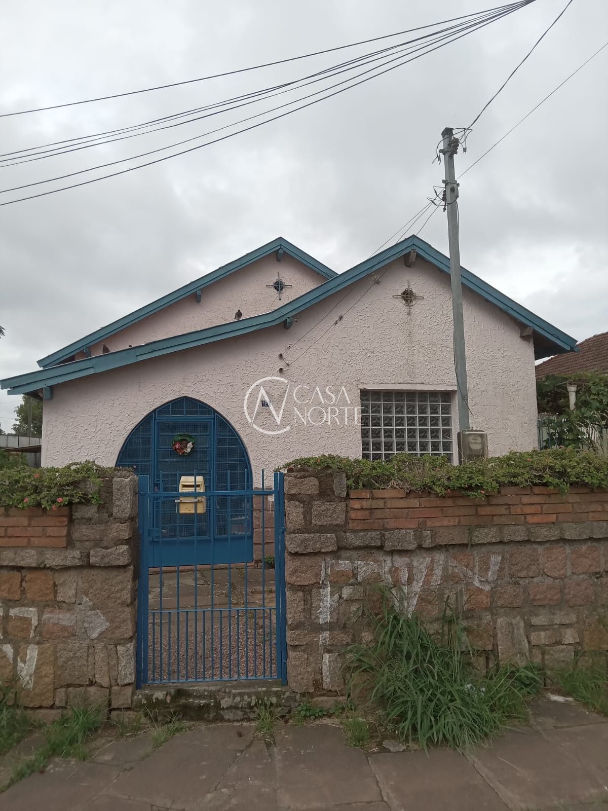 Casa à venda com 3 quartos, 106m², 1 suíte, 3 vagas, Rua Abelardo Marques no bairro Santa Tereza em Porto Alegre