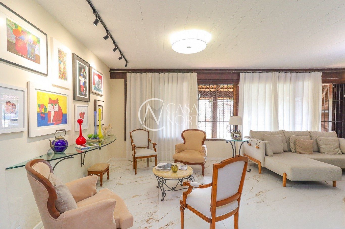 Casa à venda com 3 quartos, 300m², 1 suíte, 6 vagas, Rua Engenheiro Tito Marques Fernandes no bairro Ipanema em Porto Alegre