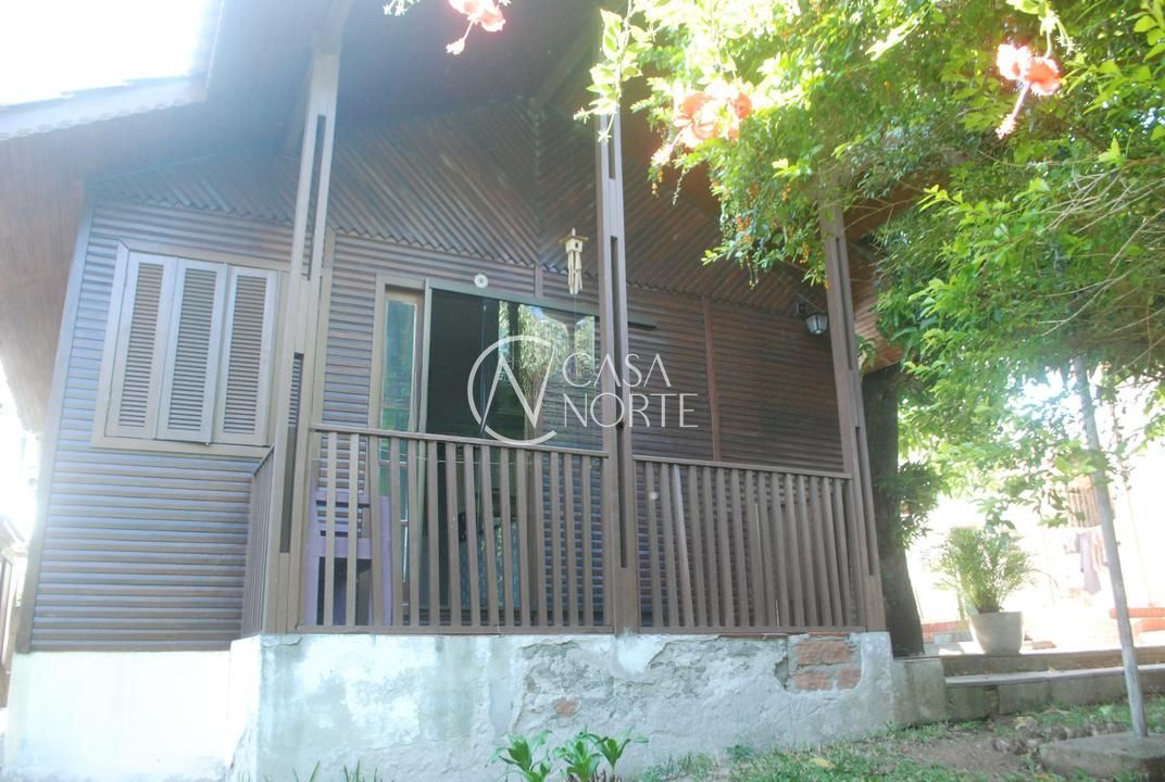 Casa à venda com 4 quartos, 230m², 4 vagas, Avenida Benno Mentz no bairro Vila Ipiranga em Porto Alegre