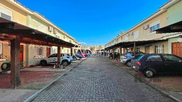 Casa de Condomínio à venda com 2 quartos, 97m², 1 suíte, 1 vaga, Rua Dorival Castilhos Machado no bairro Aberta dos Morros em Porto Alegre