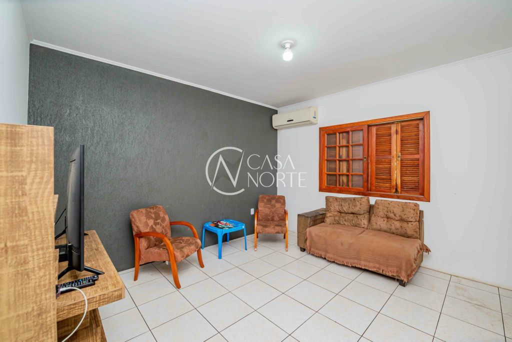 Casa à venda com 3 quartos, 94m², 4 vagas, Rua Ida Passuello no bairro Vila Nova em Porto Alegre