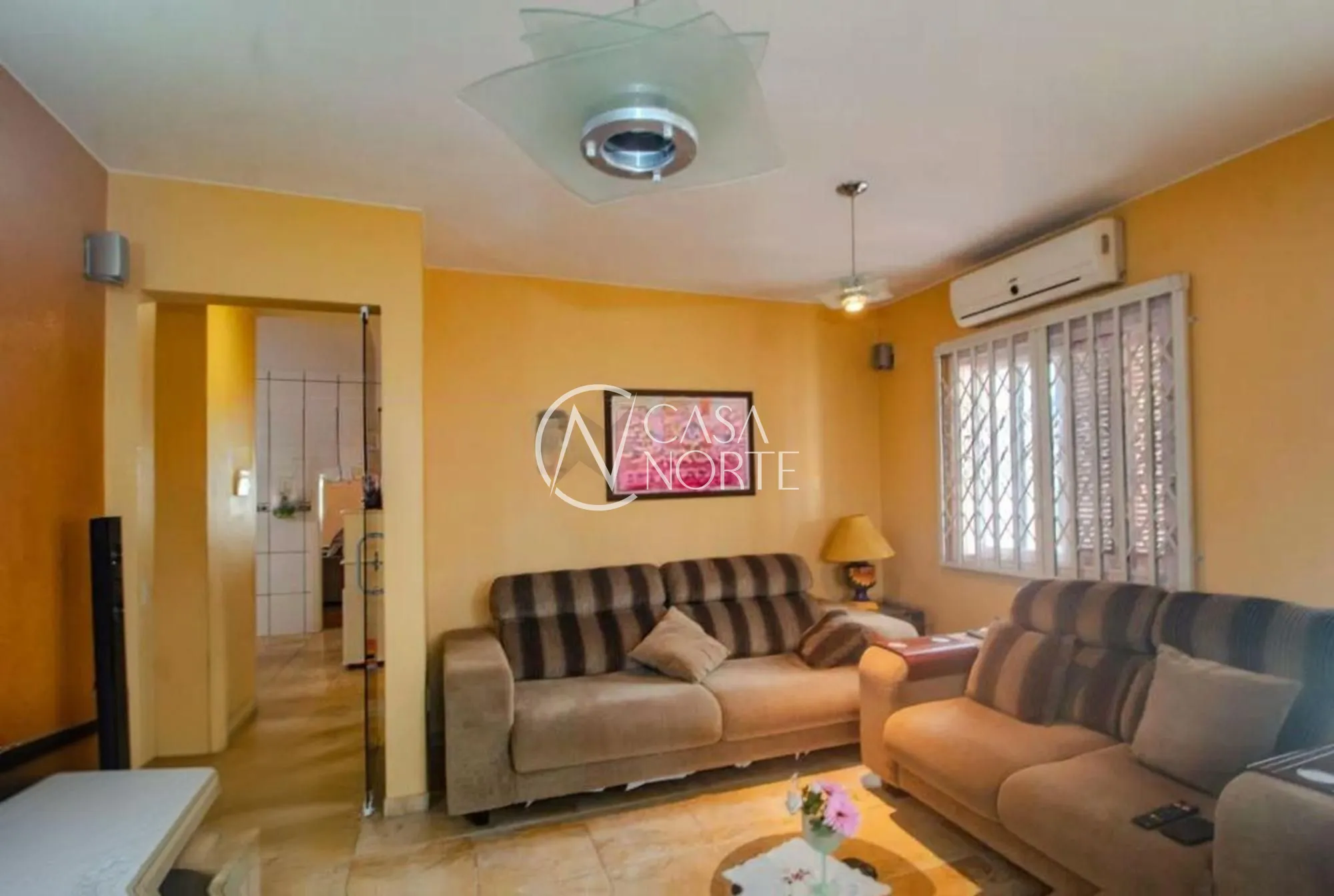 Casa à venda com 3 quartos, 140m², 2 vagas, Rua Frederico Etzberger no bairro Nonoai em Porto Alegre