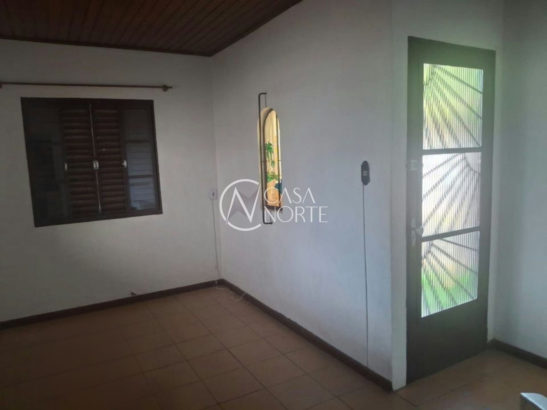 Casa à venda com 2 quartos, 90m², 3 vagas, Rua Afonso Arinos no bairro Camaquã em Porto Alegre