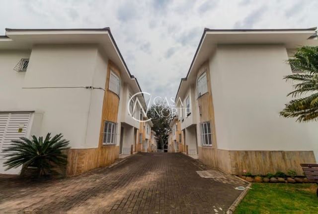 Casa de Condomínio à venda com 3 quartos, 109m², 1 suíte, 2 vagas, Avenida Engenheiro Ludolfo Boehl no bairro Teresópolis em Porto Alegre