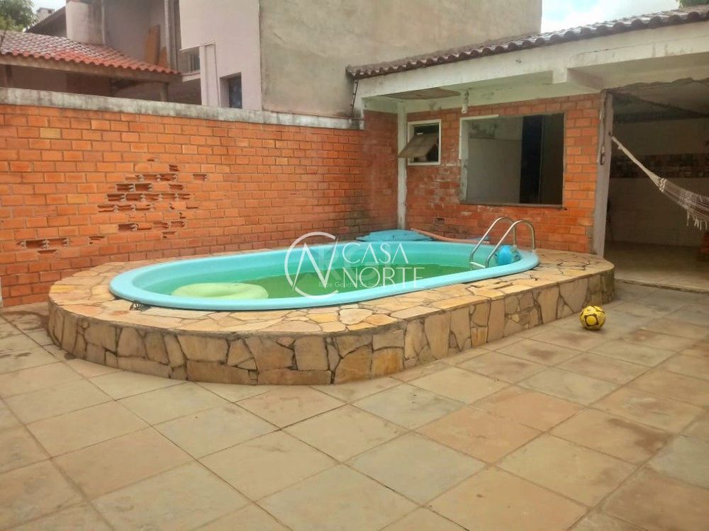 Casa à venda com 3 quartos, 120m², 1 suíte, 2 vagas, Rua José Grimberg no bairro Costa e Silva em Porto Alegre