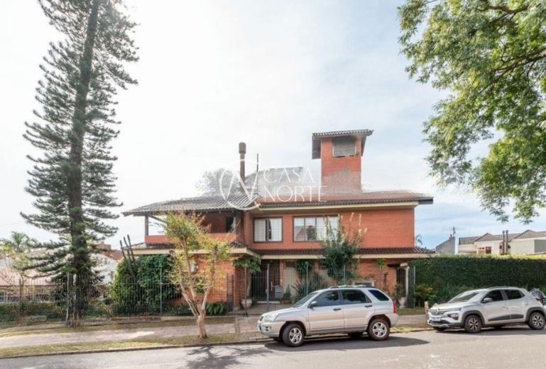 Casa à venda com 4 quartos, 400m², 3 suítes, 4 vagas, Rua Licínio Cardoso no bairro Chácara das Pedras em Porto Alegre