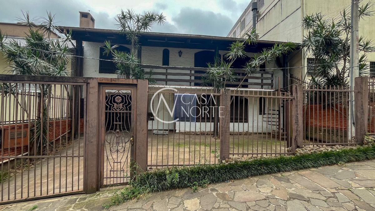 Casa à venda com 5 quartos, 390m², 1 suíte, 5 vagas, Rua Doutor Mário Totta no bairro Tristeza em Porto Alegre