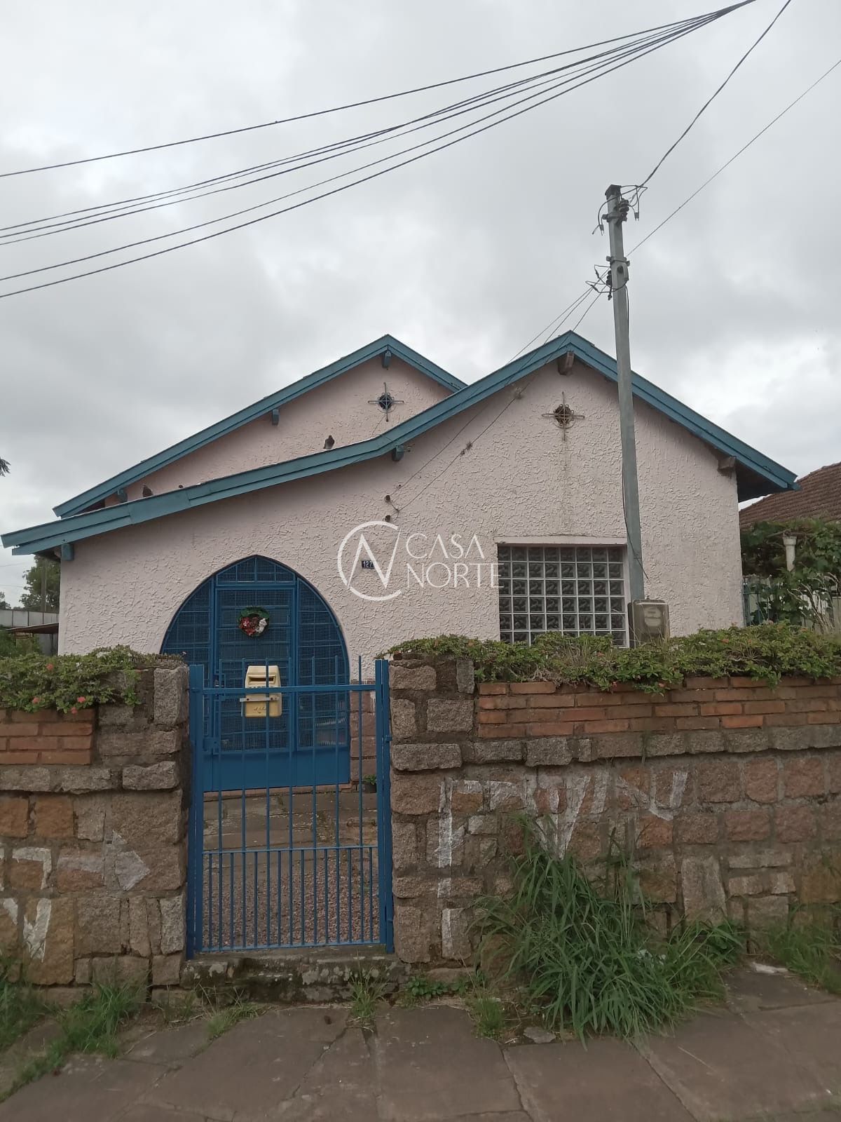 Casa à venda com 3 quartos, 106m², 1 suíte, 3 vagas, Rua Abelardo Marques no bairro Santa Tereza em Porto Alegre