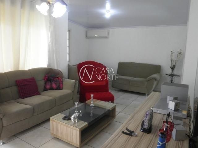 Casa à venda com 3 quartos, 318m², 1 vaga, Rua Caetano La Porta no bairro Rubem Berta em Porto Alegre