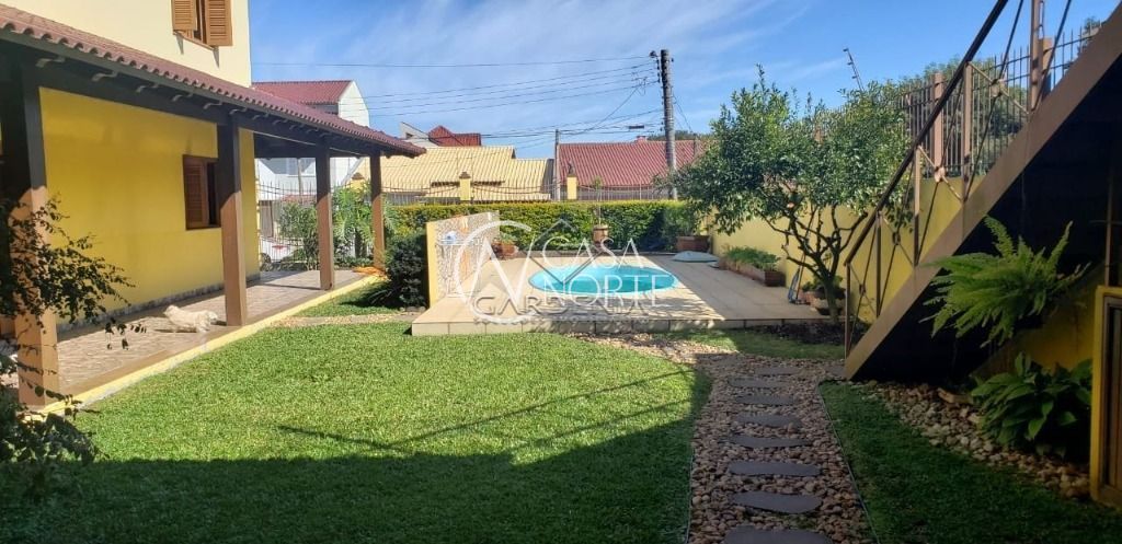 Casa à venda com 5 quartos com 791m², 3 suítes, 4 vagas, Rua Hermínio Leal de Albuquerque no bairro Rubem Berta em Porto Alegre