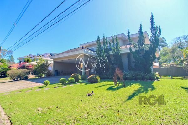 Casa de Condomínio à venda com 4 quartos, 405m², 4 suítes, 4 vagas, Avenida Juca Batista no bairro Chapéu do Sol em Porto Alegre