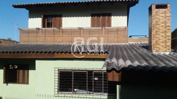 Casa à venda com 4 quartos, 450m², 1 suíte, 2 vagas, Avenida Benno Mentz no bairro Vila Ipiranga em Porto Alegre