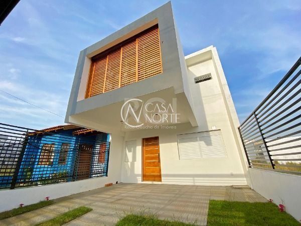 Casa à venda com 3 quartos, 217m², 1 suíte, 2 vagas, Rua Jorge Babot Miranda no bairro Aberta dos Morros em Porto Alegre