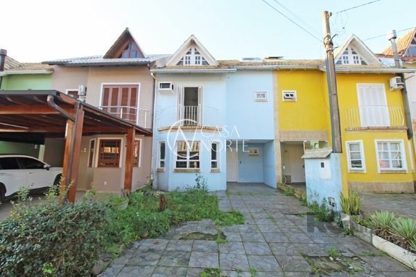 Casa de Condomínio à venda com 3 quartos, 161m², 1 suíte, 2 vagas, Rua Osorio Mendes Ouriques no bairro Guarujá em Porto Alegre