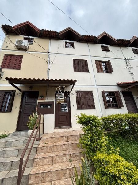 Casa de Condomínio à venda com 3 quartos, 60m², 1 vaga, Avenida Monte Cristo no bairro Vila Nova em Porto Alegre