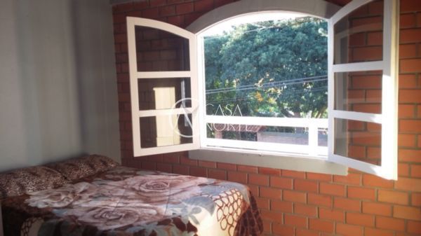 Casa à venda com 3 quartos, 109m², Rua dos Biazetto no bairro Aberta dos Morros em Porto Alegre