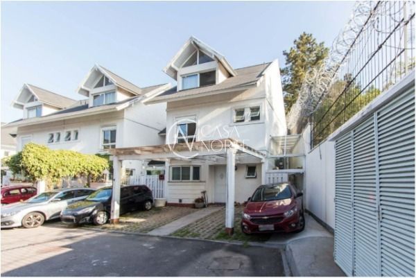 Casa de Condomínio à venda com 4 quartos, 150m², 2 suítes, 2 vagas, Rua Tocantins no bairro Lomba do Pinheiro em Porto Alegre