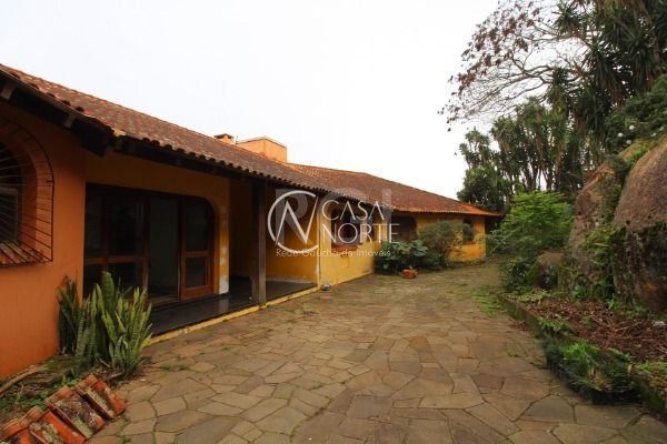 Casa à venda com 6 quartos, 596m², 4 suítes, 6 vagas, Rua Professor Antônio Davila no bairro Sétimo Céu em Porto Alegre