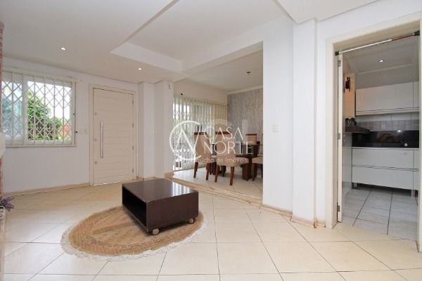 Casa de Condomínio à venda com 3 quartos, 215m², 1 suíte, 2 vagas, Doutor Arnaldo da Silva Ferreira no bairro Jardim Isabel em Porto Alegre