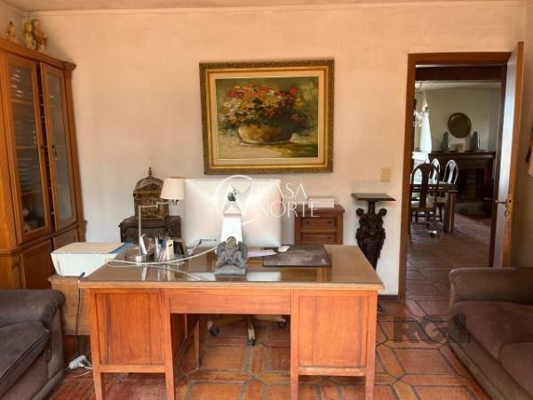 Casa à venda com 3 quartos, 327m², 1 suíte, 2 vagas, Rua Coroados no bairro Vila Assunção em Porto Alegre