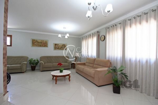 Casa de Condomínio à venda com 3 quartos, 197m², 1 suíte, 2 vagas, Rua Victor Silva no bairro Camaquã em Porto Alegre