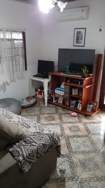 Casa à venda com 4 quartos, 160m², 2 vagas, Rua Telmo Vieira de Araujo no bairro Aberta dos Morros em Porto Alegre