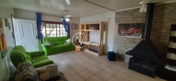 Casa à venda com 2 quartos, 120m², 1 suíte, 6 vagas, Rua Jerolomo Minuzo no bairro Vila Nova em Porto Alegre