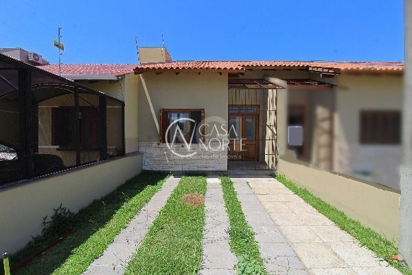 Casa à venda com 3 quartos, 103m², 1 suíte, 2 vagas, Rua Amoni no bairro Hípica em Porto Alegre