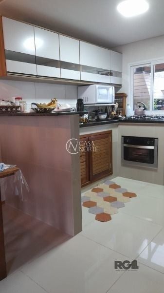Casa à venda com 2 quartos, 55m², 2 vagas, Rua das Espatódeas no bairro Ponta Grossa em Porto Alegre