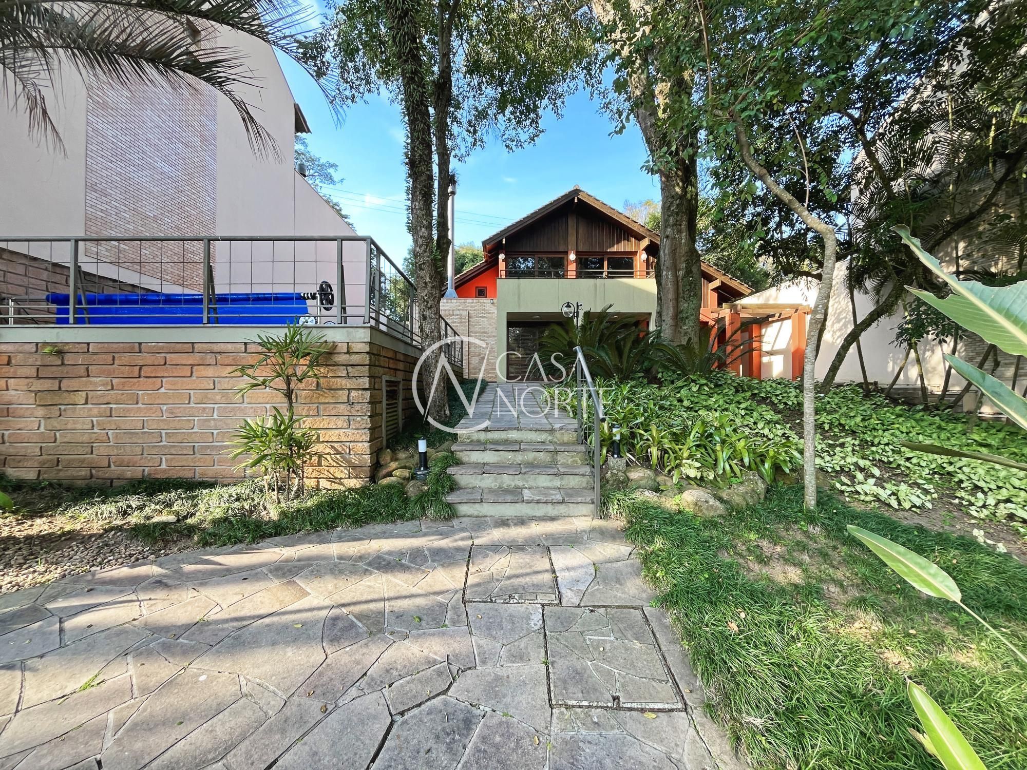 Casa de Condomínio à venda com 3 quartos, 270m², 1 suíte, 4 vagas, Rua Edgar Luiz Schneider no bairro Jardim Isabel em Porto Alegre