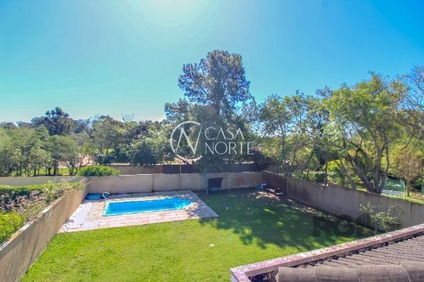 Casa de Condomínio à venda com 4 quartos, 405m², 4 suítes, 4 vagas, Avenida Juca Batista no bairro Chapéu do Sol em Porto Alegre