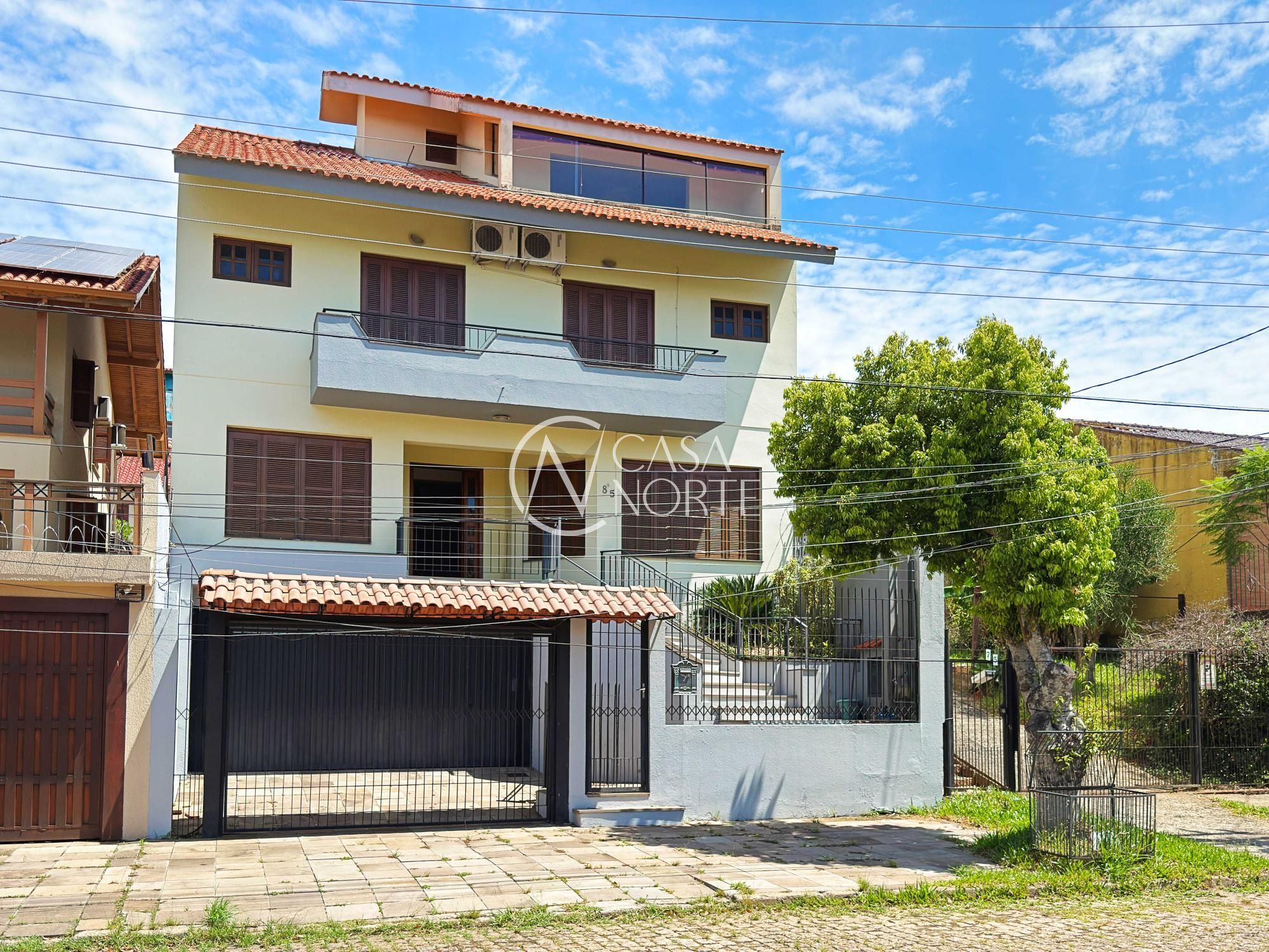 Casa à venda com 4 quartos, 437m², 3 suítes, 4 vagas, Rua Lloyd de Andrade Polidoro no bairro Ipanema em Porto Alegre