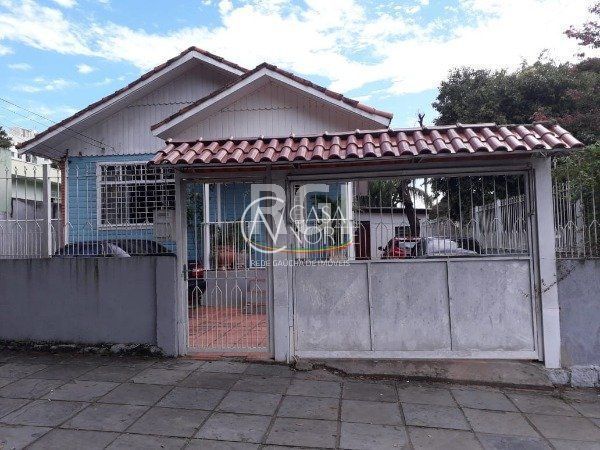 Casa à venda com 4 quartos, 90m², 3 vagas, Rua Coronel Claudino no bairro Cristal em Porto Alegre