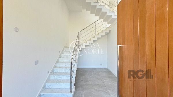 Casa de Condomínio à venda com 3 quartos, 254m², 3 suítes, 2 vagas, Rua Ivo Walter Kern no bairro Hípica em Porto Alegre